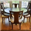 F16. Dining table and six chairs by Lacquer Craft. 30.5"h x 54"w (includes leaves) 